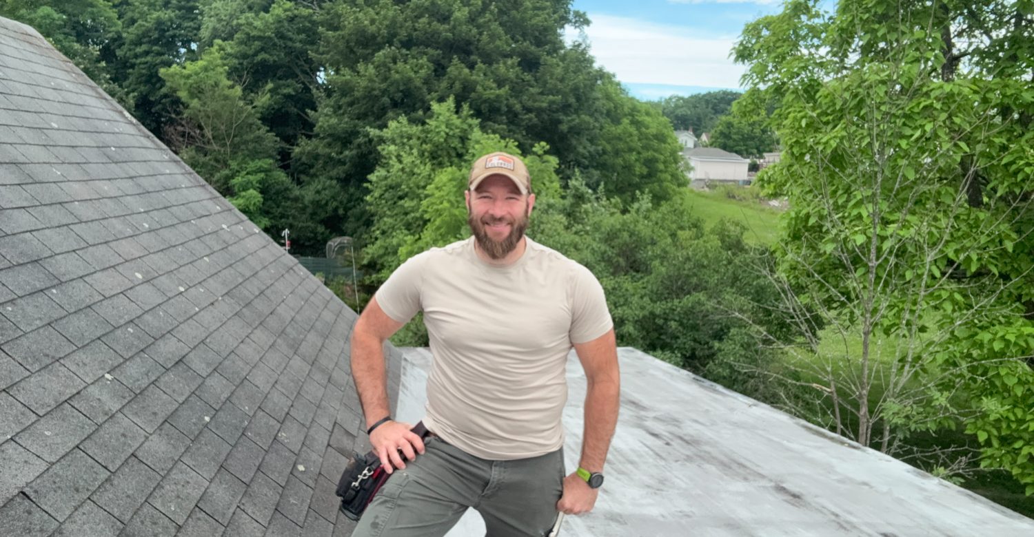 Albert Propst, independent adjuster and appraiser, inspecting a roof on site in northeastern Pennsylvania